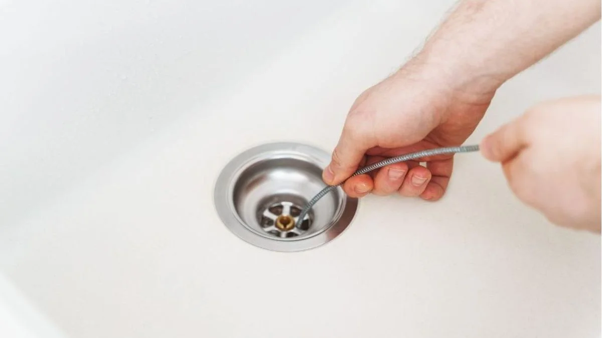 How to Use a Plumbing Snake Safely Sink, Shower and Toilet Drains